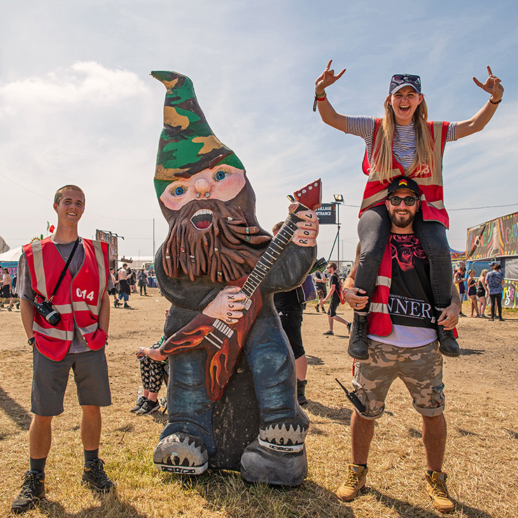 Volunteer at Music Festivals - Hotbox Events - Village volunteers with rocking gnome - 2022-001 740PxSq72Dpi